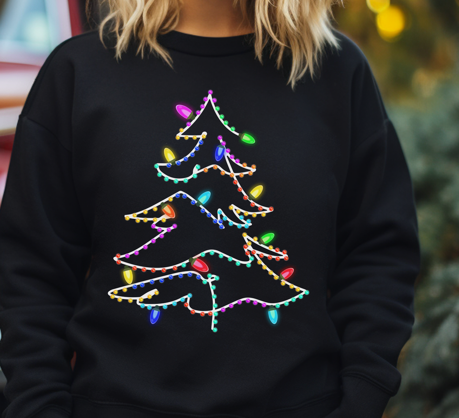 Sweater featuring a colorful Christmas tree design with lights, perfect for the holiday season.
