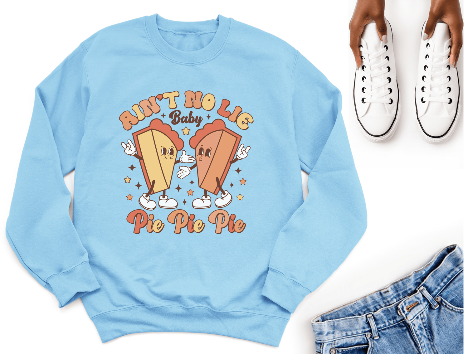 Thanksgiving themed sweater with colorful pie graphics and text, perfect for holiday celebrations.