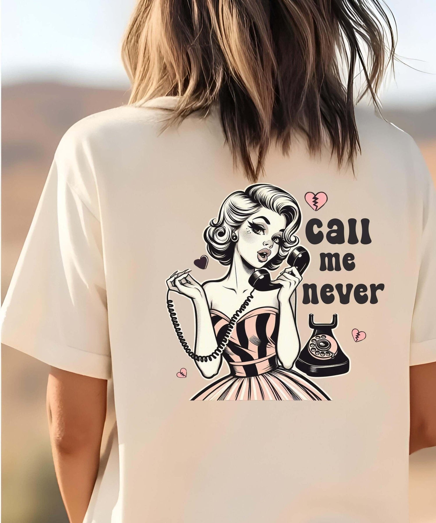 Vintage graphic tee design featuring a woman with a phone and the phrase 'call me never,' celebrating Love.