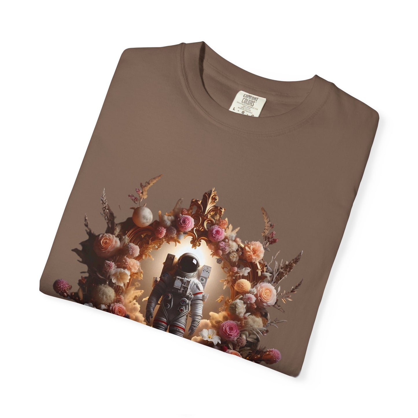 boho astronaut t-shirt featuring an astronaut surrounded by floral designs on a brown shirt.