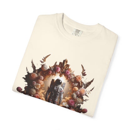 Boho astronaut t-shirt featuring a floral design and vintage astronaut graphic on an off-white background.