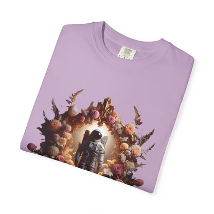 boho astronaut t-shirt featuring an astronaut surrounded by floral designs on a lavender shirt.