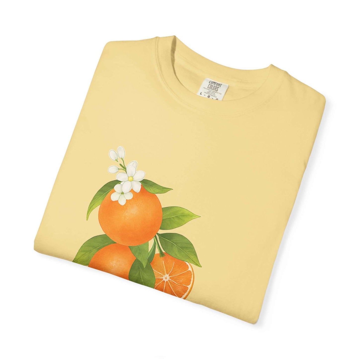 Vintage Orange Shirt, Art Graphic Fruit Shirt featuring a pastel drawing of oranges and flowers on a light yellow background.