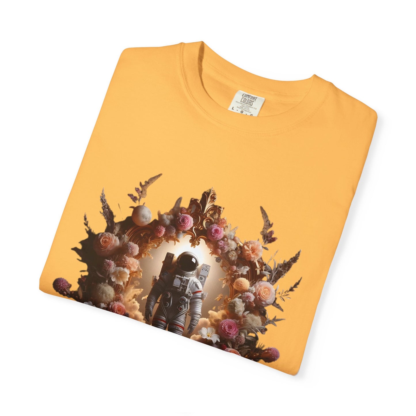Boho astronaut t-shirt with astronaut graphic and floral design on a yellow shirt background.