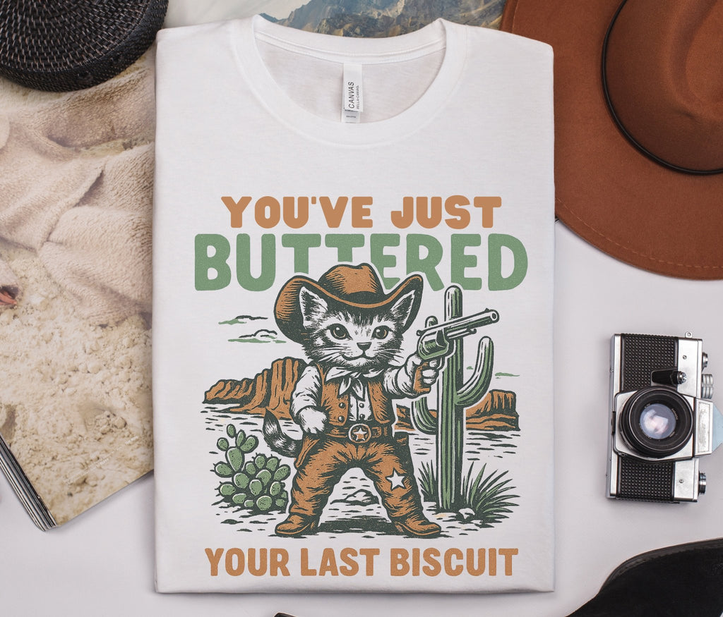 Funny Cowboy Cat Tshirt, You've Just Buttered Your Last Biscuit Shirt by PopCultureByDesign36