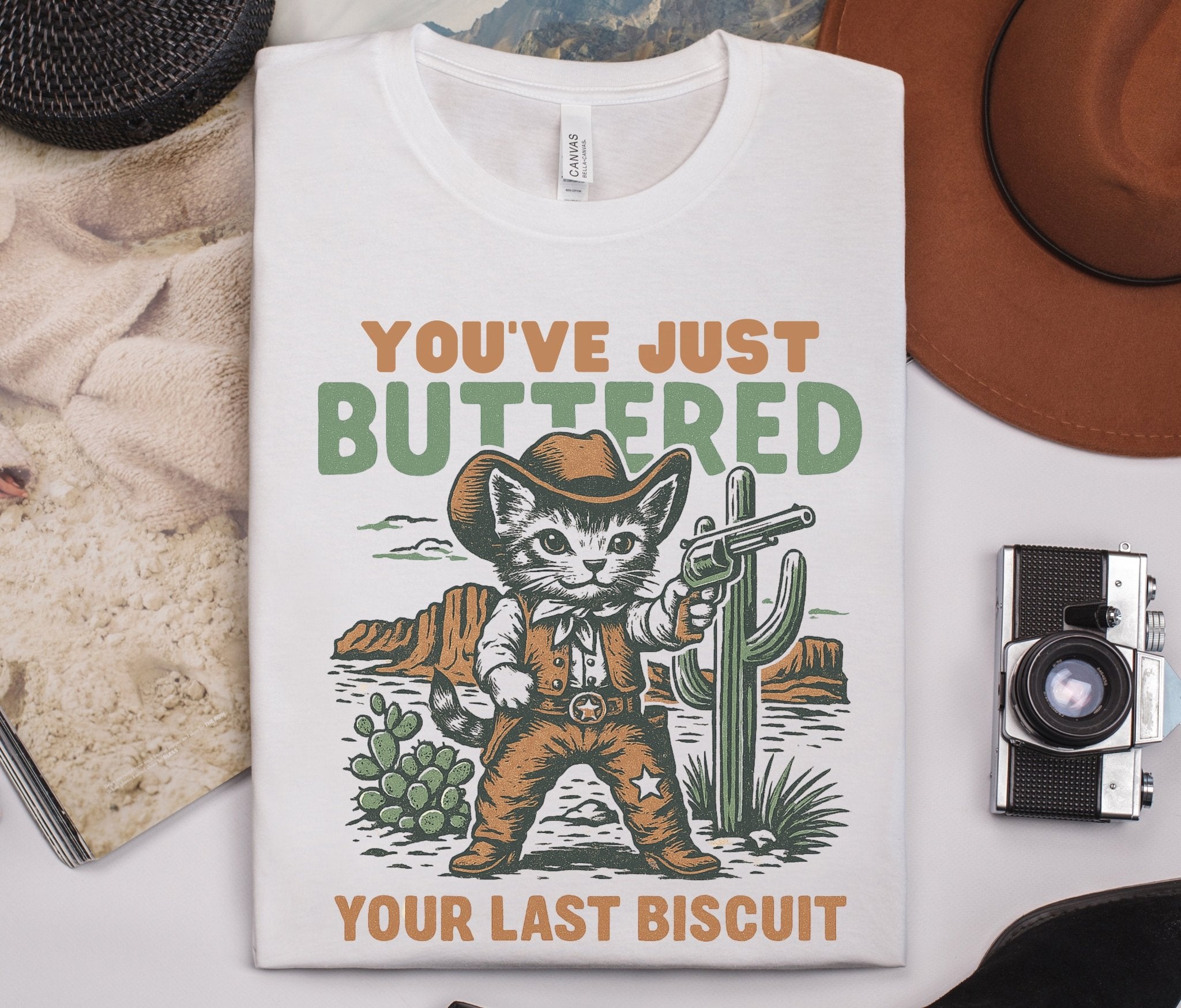 Funny Cowboy Cat Tshirt, You've Just Buttered Your Last Biscuit Shirt by PopCultureByDesign36